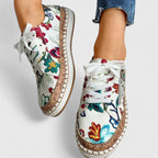 Damesneakers med blomsterprint og plateau i lærred