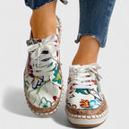 Damesneakers med blomsterprint og plateau i lærred