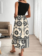 Women’s Retro Floral Midi Dress with Sleeveless Flowing Design