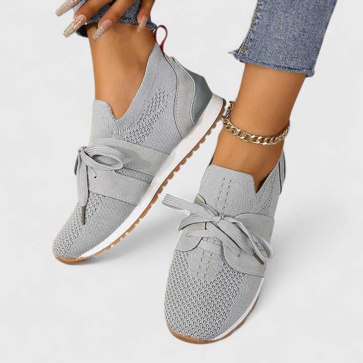 Damestrikkede sneakers med sløjfe til gåture