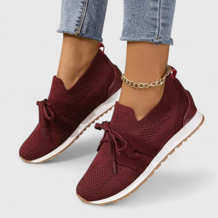 Damestrikkede sneakers med sløjfe til gåture