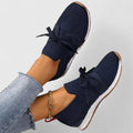 Damestrikkede sneakers med sløjfe til gåture