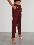 Pantalones jogger elegantes de cuero sintético para mujer