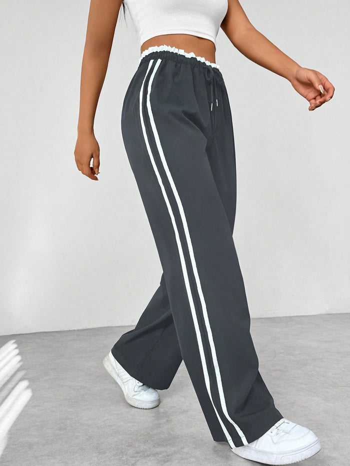Pantalon de survêtement rayé pour femme à jambes larges