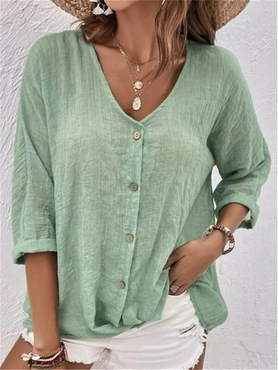 Blouse décontractée à col en V et fermeture boutonnée pour femme