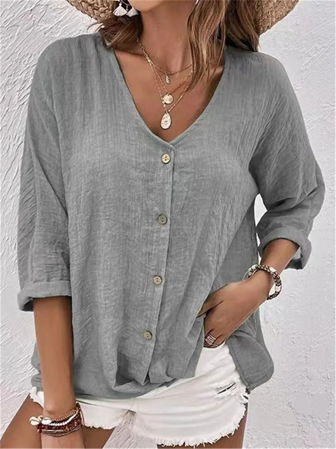 Blouse décontractée à col en V et fermeture boutonnée pour femme