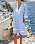 Vestito a tunica da donna a righe con scollo a V