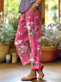 Damenhose mit Rosendruck und schmal zulaufendem Bein
