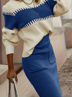 Completo da donna con maglione in maglia a coste e gonna midi