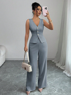 Completo da donna con gilet sartoriale e pantaloni a gamba larga