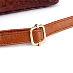 Strukturierte Damenhandtasche mit Krokodilprägung