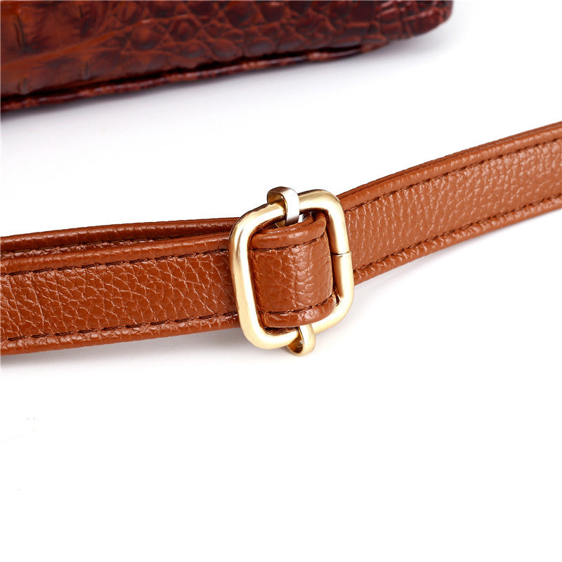 Strukturierte Damenhandtasche mit Krokodilprägung