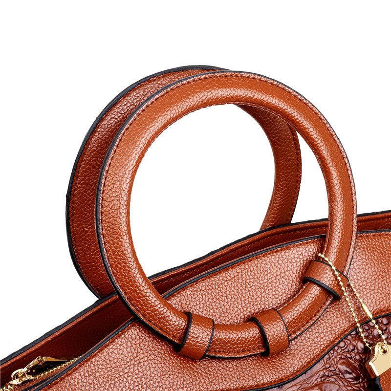 Strukturierte Damenhandtasche mit Krokodilprägung