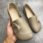 Slip-on-loafers för kvinnor med rosettdetalj