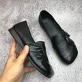 Slip-on-loafers för kvinnor med rosettdetalj