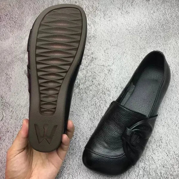 Slip-on-loafers för kvinnor med rosettdetalj