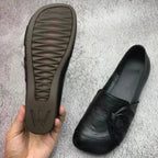 Slip-on-loafers för kvinnor med rosettdetalj