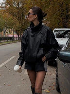 Blouson de motard asymétrique pour femme à col montant