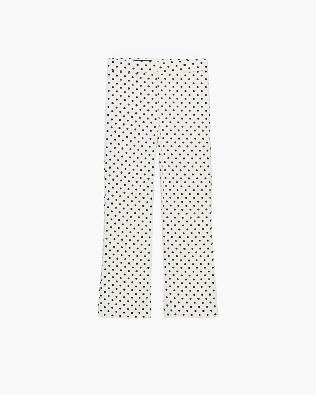 Ensemble femme composé d’une veste à pois et d’un pantalon à jambes larges