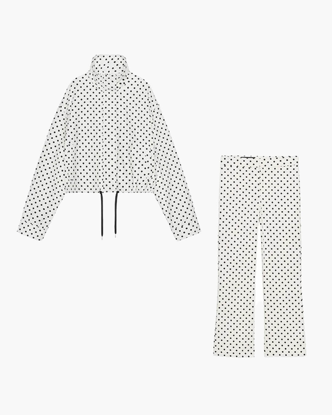 Ensemble femme composé d’une veste à pois et d’un pantalon à jambes larges