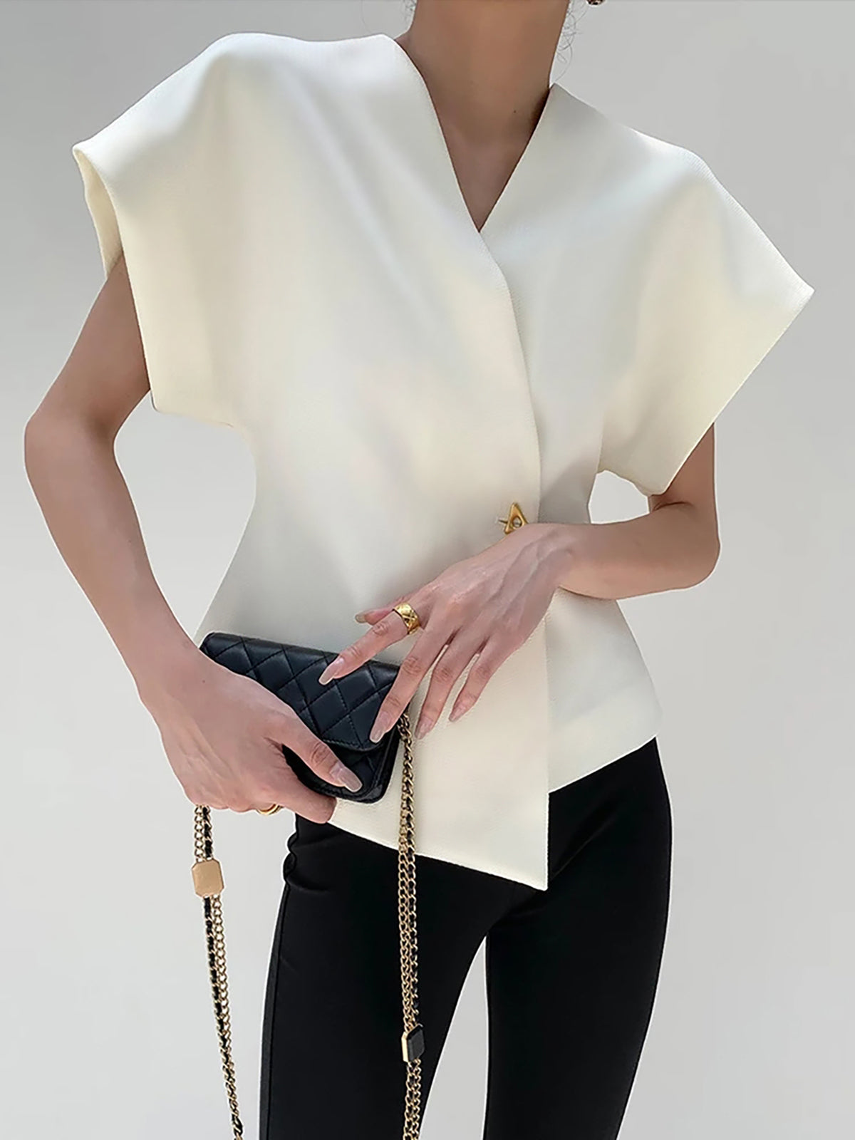 Women's Elegant V-Neck Top with Structured Sleeves for Smart Styling