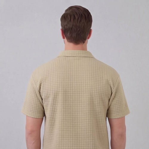 Ensemble deux pièces texturé pour homme avec polo à demi-fermeture éclair et shorts