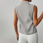 Blusa de mujer a rayas, sin mangas y con cuello mao