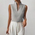 Blusa de mujer a rayas, sin mangas y con cuello mao